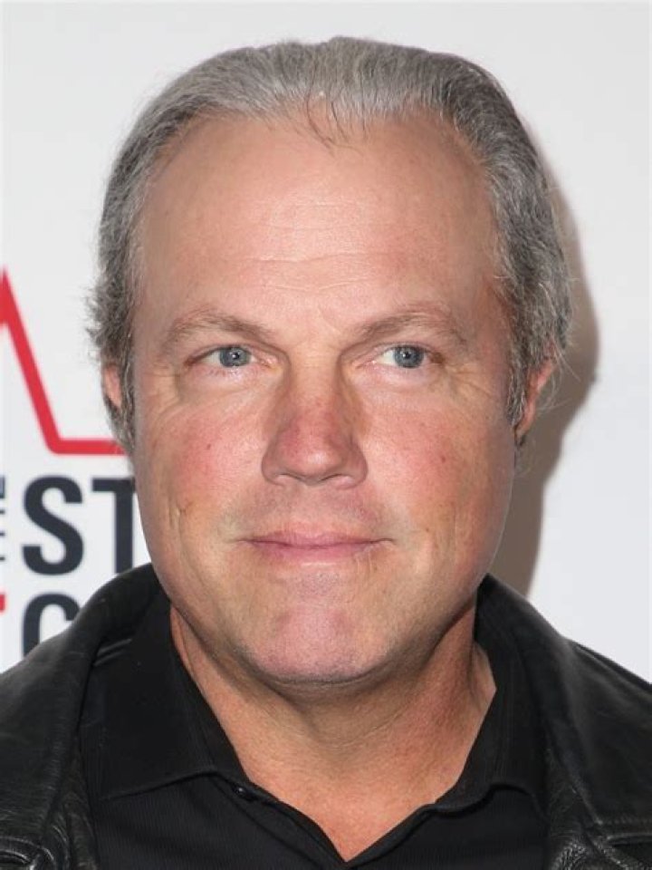 How tall is Adam Baldwin